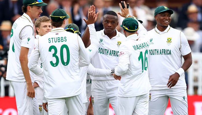 South Africas Kagiso Rabada celebrates with teammates after taking the wicket of Australias Cameron Green, caught out by Aiden Markram on June 11, 2025. — Reuters