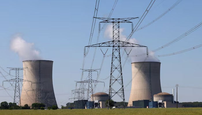 A general view shows cooling towers and reactors of the Electricite de France (EDF) nuclear power plant in Cattenom, France, June 13, 2023. — Reuters