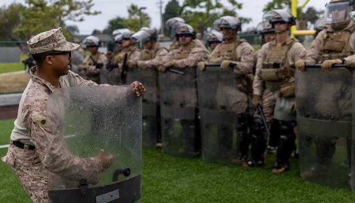 US Marines with 2nd Battalion, 7th Marine Regiment, 1st Marine Division, who were placed in an alert status over the weekend, rehearse crowd control tactics at a base in the greater Los Angeles area, California, US, June 10, 2025. —Reuters