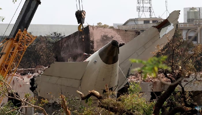 A crane removes the wreckage of the Air India Boeing 787-8 Dreamliner aircraft, which crashed during take-off from an airport, in Ahmedabad, India, June 14, 2025. — Reuters