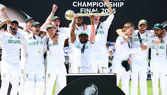 South Africas Temba Bavuma lifts the ICC Test Championship Mace on the podium with teammates after winning the ICC World Test Championship Final against Australia at Lords Cricket Ground, London, Britain, June 14, 2025. — Reuters