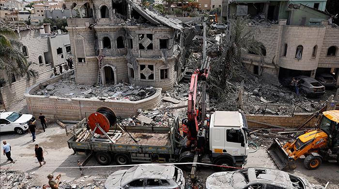 Iran missiles kill at least 10 in Israel in night of mutual attacks