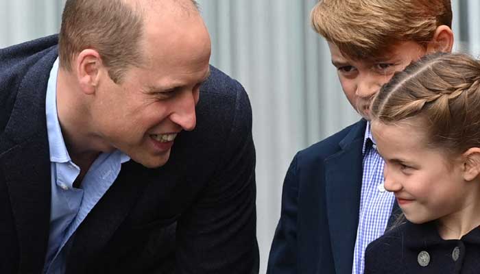 Princess Charlottes photo with Prince William sparks scarf debate