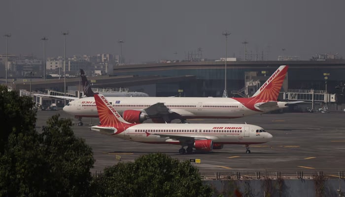 Air India passenger aircraft are seen on the tarmac at Chhatrapati Shivaji International airport in Mumbai, India, February 14, 2023. — Reuters