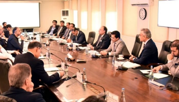 Minister for Finance and Revenue Senator Muhammad Aurangzeb chairs the inaugural meeting of a high-level committee formed to monitor petroleum prices amid regional tensions on Monday. — APP
