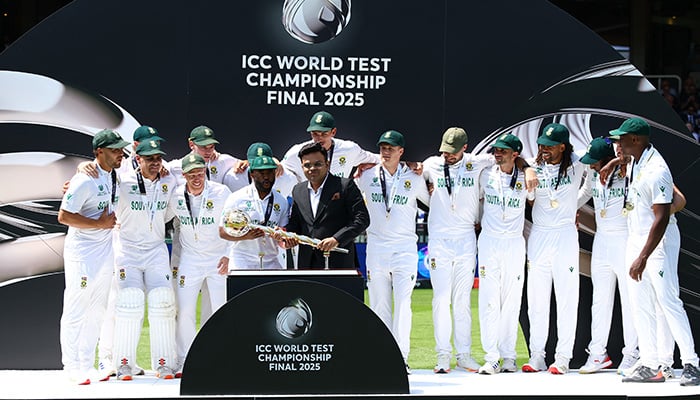 ICC chairman Jay Shah hands over the ICC Test Championship Mace to South Africas Temba Bavuma as they pose for a photograph on the podium, Lords Cricket Ground, London, Britain, June 14, 2025. — Reuters