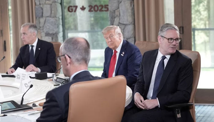 Prime Minister Keir Starmer and US President Donald Trump attend the first working session at the G7 leaders summit in Kananaskis, Alberta, Canada June 16, 2025. — Reuters