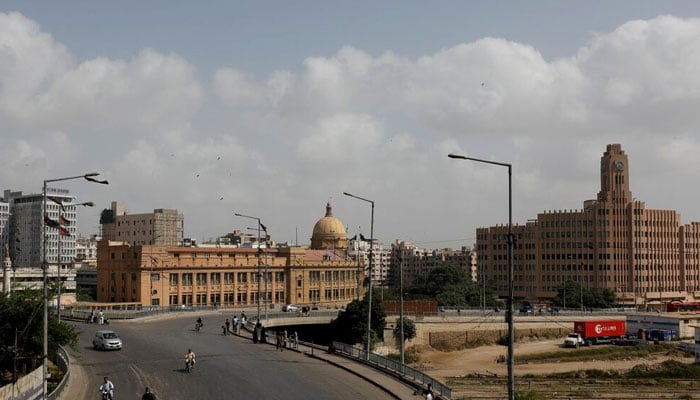 View of partial traffic with the Karachi Port Trust building, in the background, during a shutter down and wheel-jam strike called by the traders on September 2, 2023. — Reuters