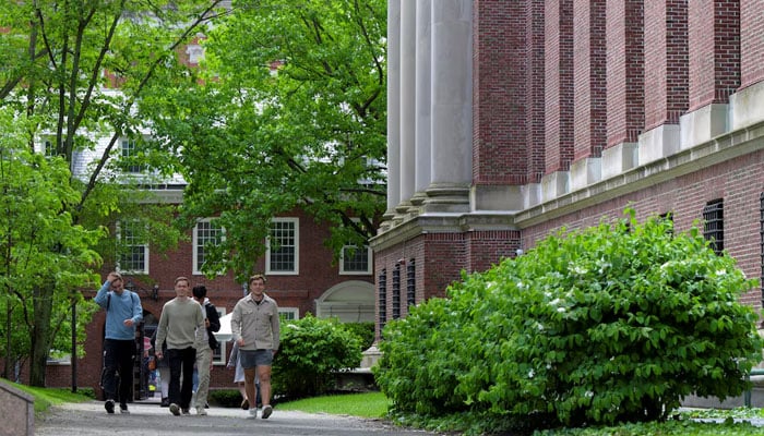 Students walk on the campus of Harvard University in Cambridge, Massachusetts, US, May 23, 2025, Reuters