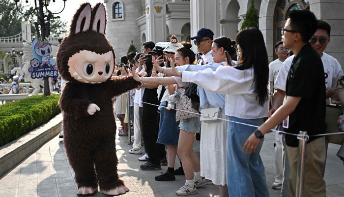 The character Labubu takes part in a performance at the Pop Mart theme park Pop Land in Beijing, China on June 18, 2025. — AFP