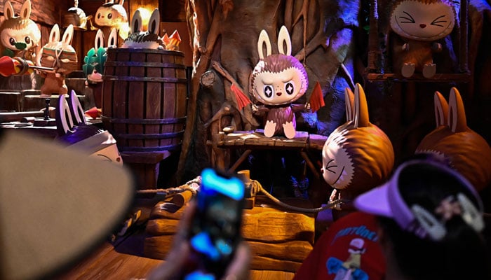 The character Labubu in an exhibition hall as people visit Pop Mart theme park Pop Land in Beijing, China on June 18, 2025. — AFP