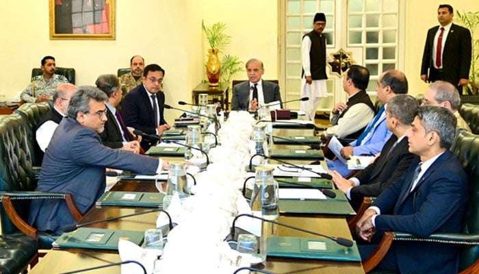 This representational image shows Prime Minister Shehbaz Sharif (centre) during a high-level meeting. — APP/File