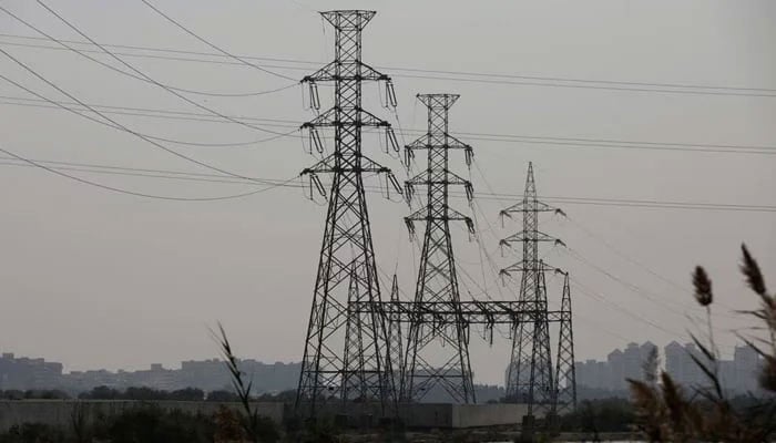 A power transmission tower is seen a day after a country-wide power breakdown, in Karachi, Pakistan, January 24, 2023. — Reuters
