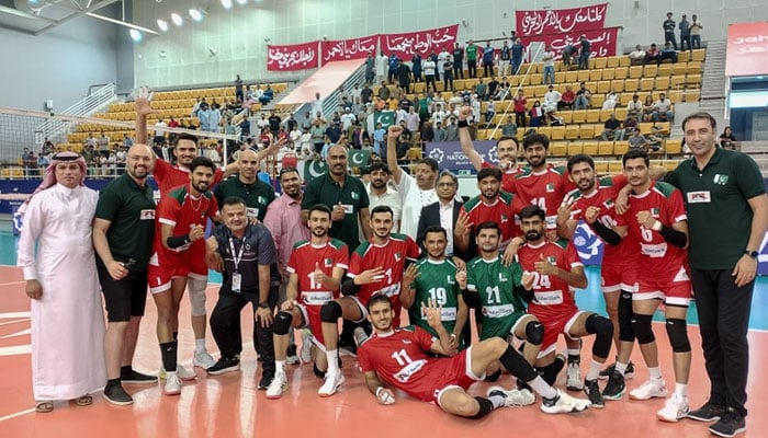 Pakistan players celebrate after winning their AVC Mens Volleyball Nations Cup match against Indonesia at the Isa bin Rashid Hall in Isa Town, Bahrain on June 21, 2025. — Pakistan Volleyball Federation
