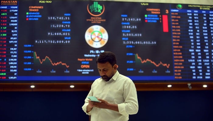 Broker is busy in trading at Pakistan Stock Exchange (PSX) in Karachi on Wednesday, June 18, 2025. — PPI