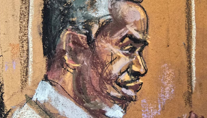 Sean Diddy Combs speaks with his defense team before the days session of his sex trafficking trial in New York City, New York, U.S., June 18, 2025 in this courtroom sketch. REUTERS/Jane Rosenberg/File Photo