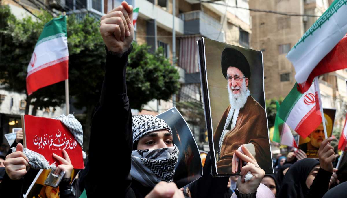 A demonstrator holds a picture of Irans Supreme Leader Ayatollah Ali Khamenei as people gather for a rally in solidarity with Iran after Friday prayers, amid the Iran-Israel conflict, in Beiruts southern suburbs, Lebanon on June 20, 2025. — Reuters