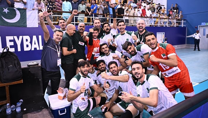 Pakistan players celebrate after defeating Qatar during their AVC Mens Volleyball Nations Cup semi-final at the Manamas Isa bin Rashid Hall in Isa Town, Bahrain on June 23, 2025. — Facebook/Pakistan Volleyball Federation