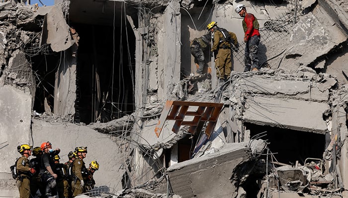 Emergency personnel work at an impacted residential site, following a missile attack from Iran on Israel, amid the Israel-Iran conflict, in Beer Sheva, Israel June 24, 2025. — Reuters