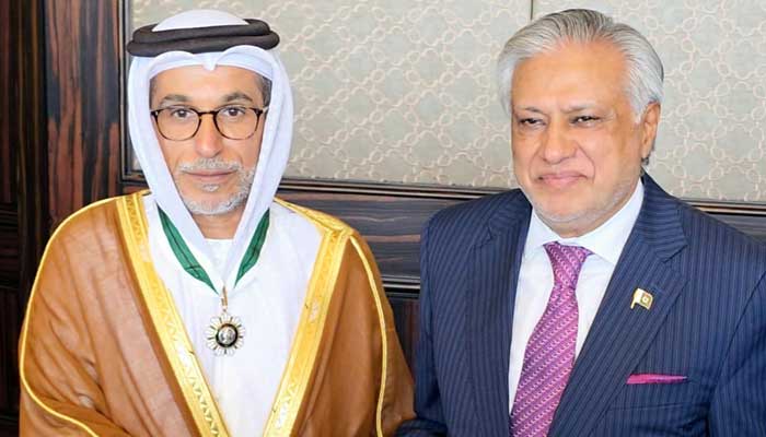 Deputy PM Ishaq Dar presents the Hilal-e-Quaid-e-Azam Award to Mohamed Saif Al Suwaidi, recognising his pivotal role in enhancing Pakistan-UAE relations. — Reporter