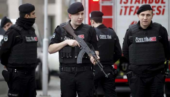 Turkish riot police stand guard in front of the Justice Palace in Istanbul March 31, 2015. — Reuters