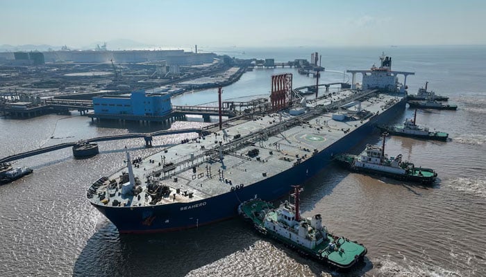 An aerial view shows a crude oil tanker at an oil terminal off Waidiao island in Zhoushan, Zhejiang province, China January 4, 2023. China Daily via REUTERS