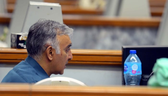 Broker is busy in trading at Pakistan Stock Exchange (PSX) in Karachi on Wednesday, June 18, 2025. — PPI