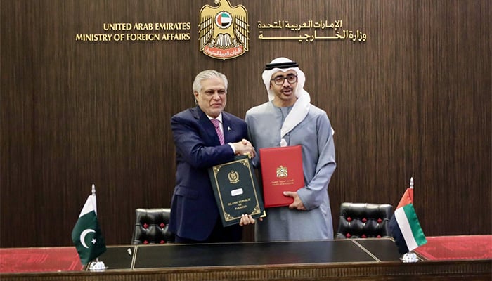Deputy Prime Minister and Foreign Minister Senator Ishaq Dar (left) and his UAE counterpart Sheikh Abdullah bin Zayed Al Nahyan shaking hands after signing MoUs in Abu Dhabi, UAE. — X/@ForeignOfficePk