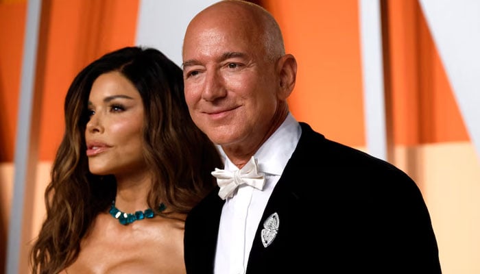 Lauren Sanchez and Jeff Bezos arrive at the Vanity Fair Oscars party after the 97th Academy Awards, in Beverly Hills, California, US, March 2, 2025. — Reuters