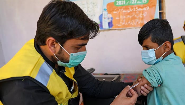 Pakistan faces ongoing challenge in eradicating zero-dose children: study 1 A paramedic administers a vaccine jab to a boy in this undated image taken in Pakistan. — Unicef