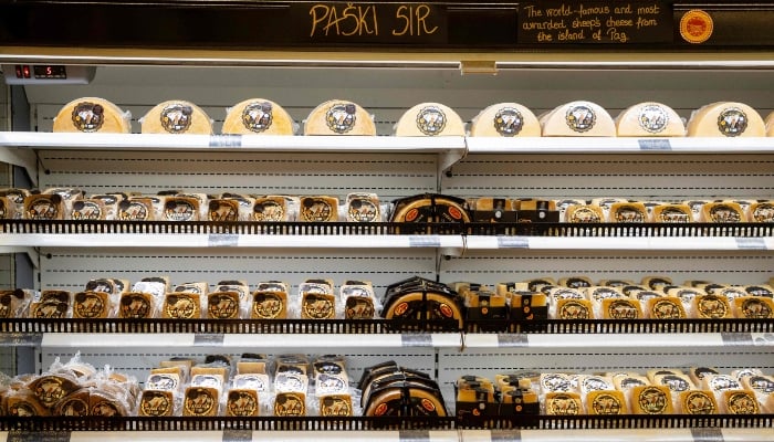 This photograph shows different types of Pag cheese in the fridge at the cheese shop on the Gligora family estate in town of Kolan at the island of Pag, Croatia, on June 11, 2025. — AFP