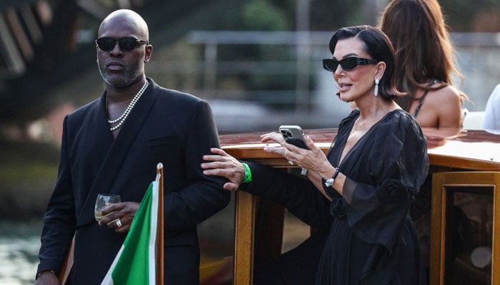 Corey Gamble and Kris Jenner stand on a boat, ahead of the anticipated wedding of Amazon founder Jeff Bezos and Lauren Sanchez in Venice, Italy, June 26, 2025. — Reuters