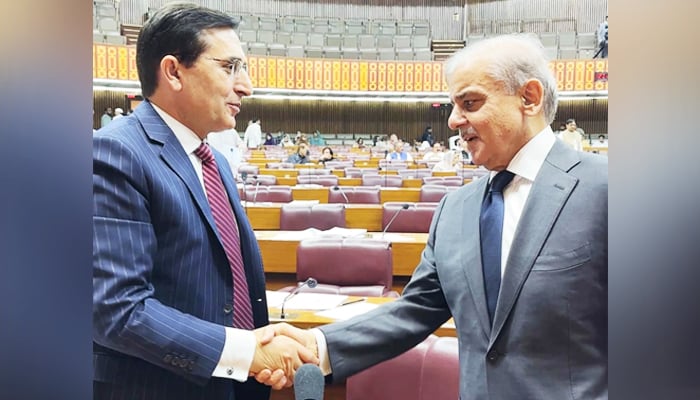 Prime Minister Shehbaz Sharif (right) meets PTI Chairman Barrister Gohar Ali Khan during a National Assembly session in Islamabad, on June 26, 2025. — Facebook@ShehbazSharif