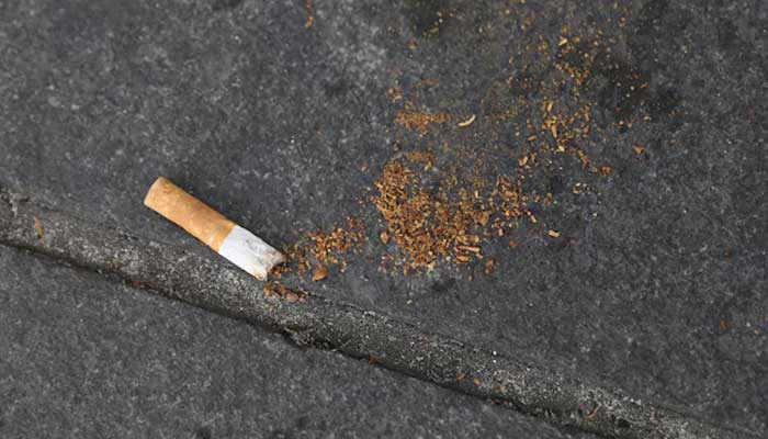 A cigarette butt lies on a street in New York, US, May 10, 2017. — Reuters