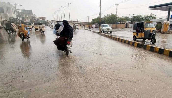 Commuters are facing difficulties due to stagnant rainwater caused by downpour of monsoon season in Quetta on June 29, 2025. — PPI