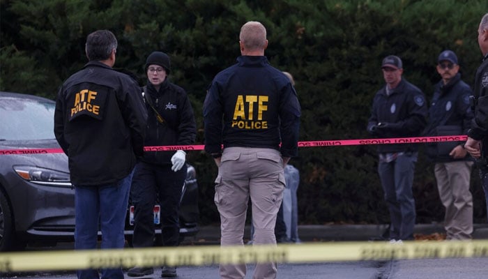 Law enforcement officers collect evidence near the scene of a shooting at the Boise Towne Square shopping mall in Boise, Idaho, US, October 25, 2021. — Reuters