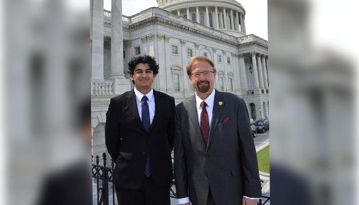 Climate Change Minister Musadik Malik’s son Rayan Malik (left) and US Congressman Charles Marion Chuck Edwards.