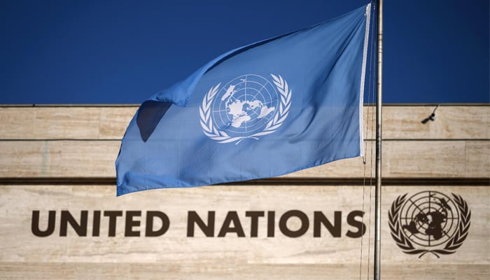 A United Nations flag flutters outside one of the organisations buildings. — AFP