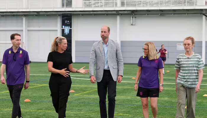 Prince William delights women footballers with surprise visit