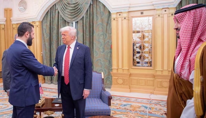 US President Donald Trump meets with Syrian President Ahmed al-Sharaa in Riyadh, Saudi Arabia, in this handout released on May 14, 2025. — Reuters