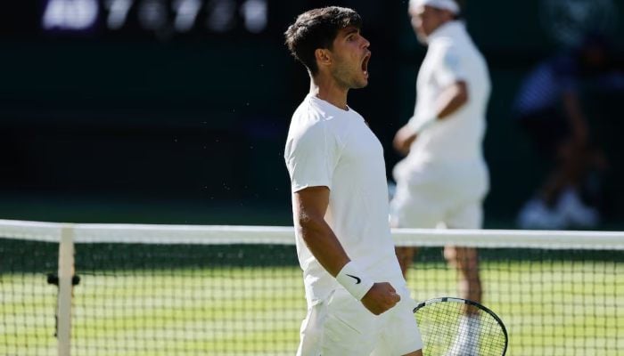 Spains Carlos Alcaraz reacts during his first round match against Italys Fabio Fognini, Wimbledon, All England Lawn Tennis and Croquet Club, London, Britain, June 30, 2025. — Reuters