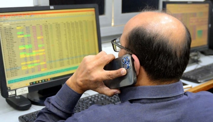 Broker is busy in trading at Pakistan Stock Exchange (PSX) in Karachi on Monday, April 7, 2025. — PPI