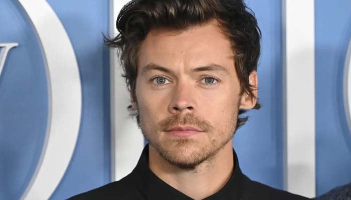 Harry Styles spotted kissing THIS woman at Glastonbury