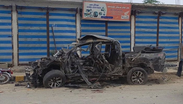 Vehicle destroyed in bomb explosion in KPs Bajaur. — X/@HaiderHotiANP