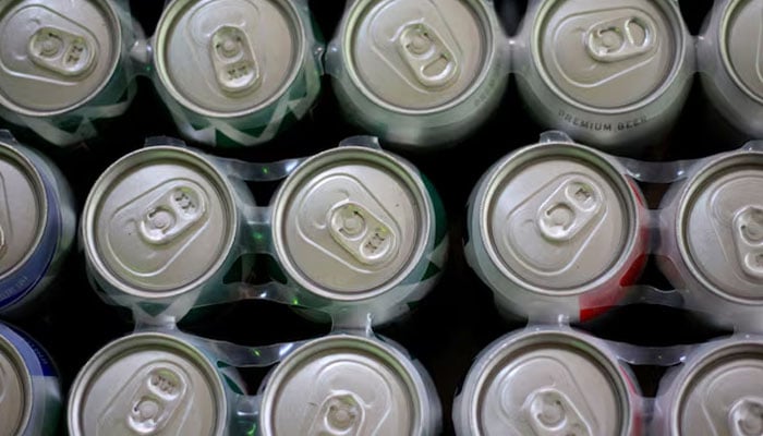 Beer cans are displayed in a store in Ciudad Juarez, Mexico, July 31, 2018. — Reuters