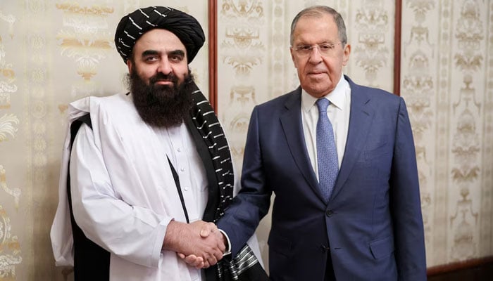 Russian Foreign Minister Sergei Lavrov shakes hands with Acting Foreign Minister of Afghanistans Taliban movement Amir Khan Muttaqi during a meeting in Moscow, Russia, October 4, 2024. — Reuters