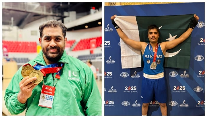(From left) Pakistans Furqan Khan and Ali Nawaz gesture for photos after winning medals. — Reporter