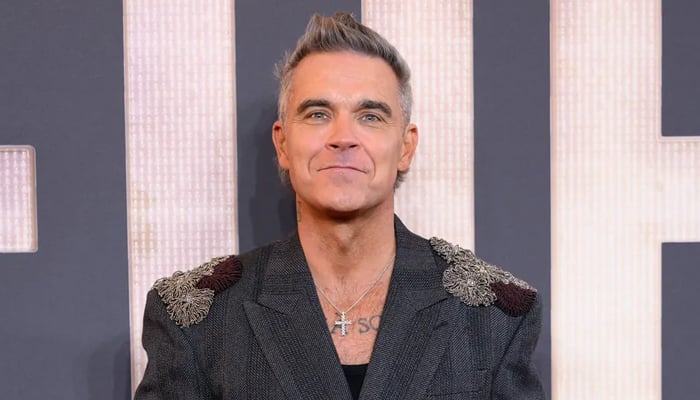Robbie Williams to receive knighthood for musical services