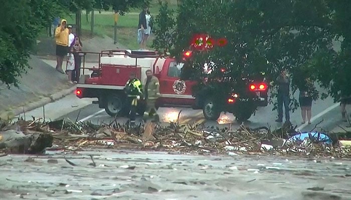First responders survey rising flood waters of the Guadalupe River after flash flooding in Kerr County, Texas, U.S. July 4, 2025 in a still image from video. — Reuters