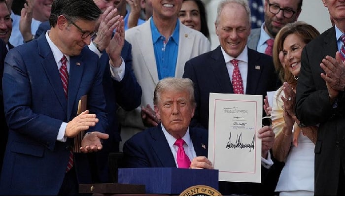 US President Donald Trump signs the sweeping spending and tax legislation, known asOne Big Beautiful Bill Act, at the White House in Washington, DC, US, July 4, 2025. — Reuters